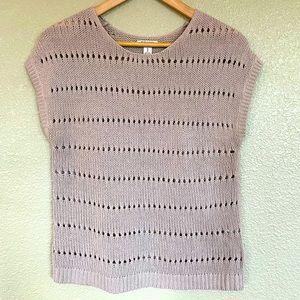 Sleeveless sweater tops